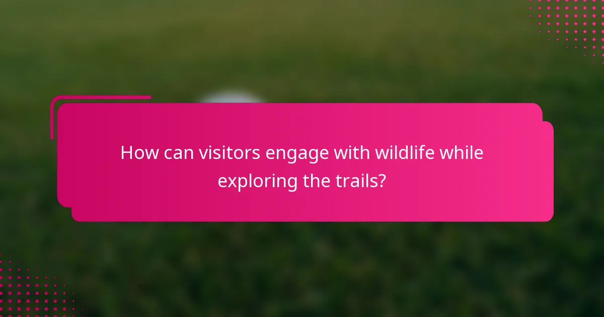 How can visitors engage with wildlife while exploring the trails?